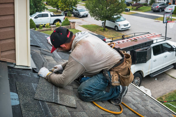 Professional Roof Replacement technician working in Sherburne, NY
